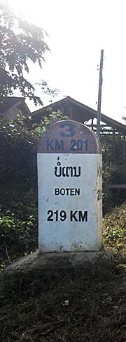 Kilometer Stone to Boten by Asienreisender